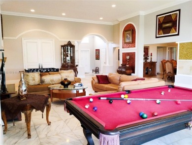 The moment you walk in, you feel it -- space, light, freedom. A on Woodlands Country Club in Florida - for sale on GolfHomes.com, golf home, golf lot