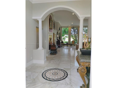The moment you walk in, you feel it -- space, light, freedom. A on Woodlands Country Club in Florida - for sale on GolfHomes.com, golf home, golf lot