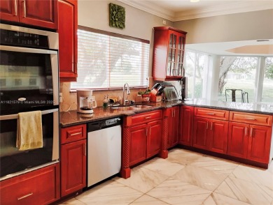 The moment you walk in, you feel it -- space, light, freedom. A on Woodlands Country Club in Florida - for sale on GolfHomes.com, golf home, golf lot