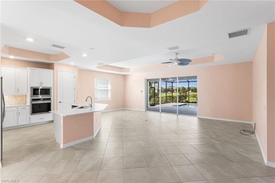 GOLF CART INCLUDED & SELLER OFFERING PAINTING CONCESSION - on Panther Run Golf Club in Florida - for sale on GolfHomes.com, golf home, golf lot