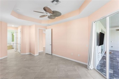 GOLF CART INCLUDED & SELLER OFFERING PAINTING CONCESSION - on Panther Run Golf Club in Florida - for sale on GolfHomes.com, golf home, golf lot