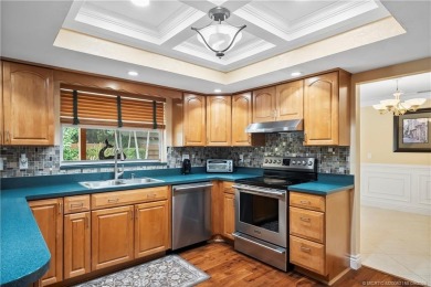 Live the lifestyle you have dreamed of in this private compound on Martin County Golf Course in Florida - for sale on GolfHomes.com, golf home, golf lot