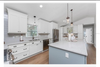 You must see to believe! This beautifully upgraded 2-bedroom on Duffys Golf Center in Florida - for sale on GolfHomes.com, golf home, golf lot