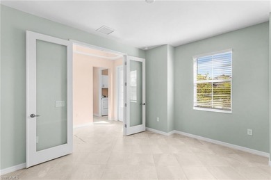 GOLF CART INCLUDED & SELLER OFFERING PAINTING CONCESSION - on Panther Run Golf Club in Florida - for sale on GolfHomes.com, golf home, golf lot