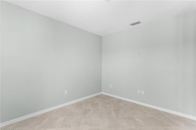 GOLF CART INCLUDED & SELLER OFFERING PAINTING CONCESSION - on Panther Run Golf Club in Florida - for sale on GolfHomes.com, golf home, golf lot