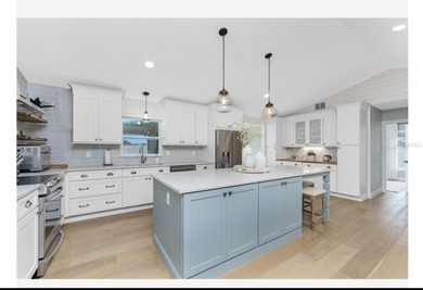 You must see to believe! This beautifully upgraded 2-bedroom on Duffys Golf Center in Florida - for sale on GolfHomes.com, golf home, golf lot