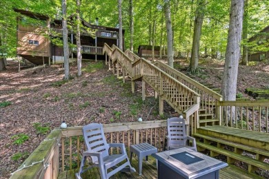 Charming Lakefront Cabin in Hideaway Hills Resort awaits you! on Hide-A-Way Hills Golf Club in Ohio - for sale on GolfHomes.com, golf home, golf lot
