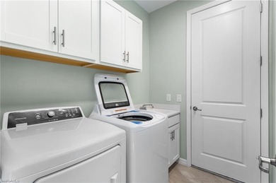 GOLF CART INCLUDED & SELLER OFFERING PAINTING CONCESSION - on Panther Run Golf Club in Florida - for sale on GolfHomes.com, golf home, golf lot