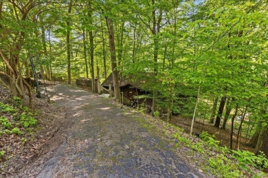Charming Lakefront Cabin in Hideaway Hills Resort awaits you! on Hide-A-Way Hills Golf Club in Ohio - for sale on GolfHomes.com, golf home, golf lot