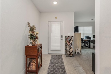 Feel right at home the moment you arrive at this bright and airy on Deep Creek Golf Club in Florida - for sale on GolfHomes.com, golf home, golf lot