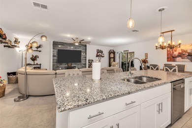 Feel right at home the moment you arrive at this bright and airy on Deep Creek Golf Club in Florida - for sale on GolfHomes.com, golf home, golf lot