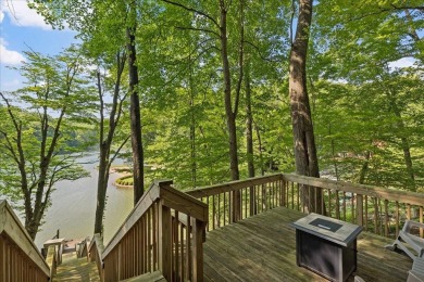 Charming Lakefront Cabin in Hideaway Hills Resort awaits you! on Hide-A-Way Hills Golf Club in Ohio - for sale on GolfHomes.com, golf home, golf lot