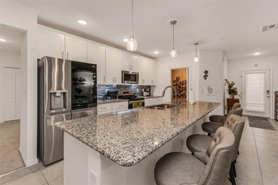 Feel right at home the moment you arrive at this bright and airy on Deep Creek Golf Club in Florida - for sale on GolfHomes.com, golf home, golf lot