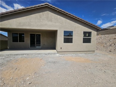 Nestled at 1410 Dutchman TRL, Bullhead City, Arizona, this on Laughlin Ranch Golf Club in Arizona - for sale on GolfHomes.com, golf home, golf lot
