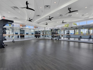 GOLF CART INCLUDED & SELLER OFFERING PAINTING CONCESSION - on Panther Run Golf Club in Florida - for sale on GolfHomes.com, golf home, golf lot