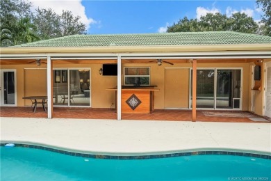 Live the lifestyle you have dreamed of in this private compound on Martin County Golf Course in Florida - for sale on GolfHomes.com, golf home, golf lot