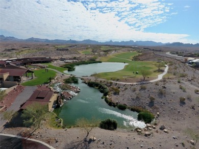 Nestled at 1410 Dutchman TRL, Bullhead City, Arizona, this on Laughlin Ranch Golf Club in Arizona - for sale on GolfHomes.com, golf home, golf lot