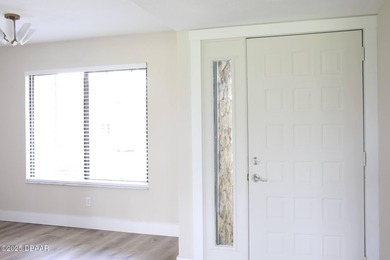 COMPLETELY RENOVATED Gated Golf Cmty - 3BR/2BA END UNIT | 128-B on The Club At Pelican Bay - North Course in Florida - for sale on GolfHomes.com, golf home, golf lot