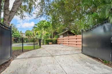 Live the lifestyle you have dreamed of in this private compound on Martin County Golf Course in Florida - for sale on GolfHomes.com, golf home, golf lot