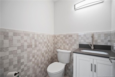 Live the lifestyle you have dreamed of in this private compound on Martin County Golf Course in Florida - for sale on GolfHomes.com, golf home, golf lot