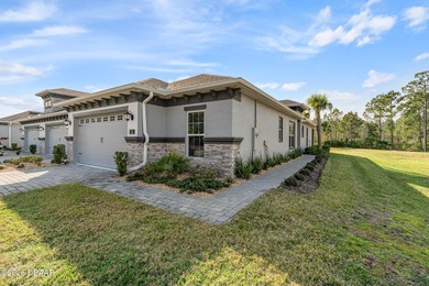 Newly designed Arbor III townhome with a desirable side entrance on Plantation Bay Golf and Country Club in Florida - for sale on GolfHomes.com, golf home, golf lot