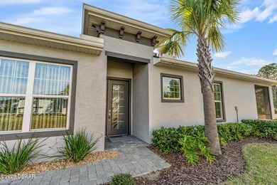 Newly designed Arbor III townhome with a desirable side entrance on Plantation Bay Golf and Country Club in Florida - for sale on GolfHomes.com, golf home, golf lot