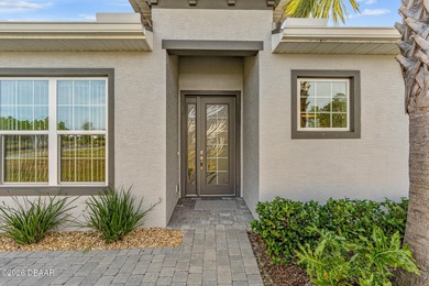 Newly designed Arbor III townhome with a desirable side entrance on Plantation Bay Golf and Country Club in Florida - for sale on GolfHomes.com, golf home, golf lot