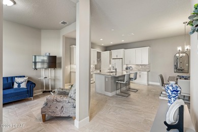 Newly designed Arbor III townhome with a desirable side entrance on Plantation Bay Golf and Country Club in Florida - for sale on GolfHomes.com, golf home, golf lot