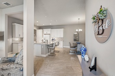 Newly designed Arbor III townhome with a desirable side entrance on Plantation Bay Golf and Country Club in Florida - for sale on GolfHomes.com, golf home, golf lot