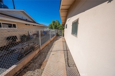 Located in the desirable 55+ community, this single-story home on Cherry Hills Golf Club in California - for sale on GolfHomes.com, golf home, golf lot