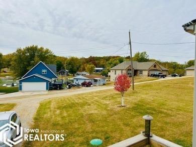 117 Horseshoe Drive may be your perfect lake getaway!  Talk on Montezuma Country Club in Iowa - for sale on GolfHomes.com, golf home, golf lot