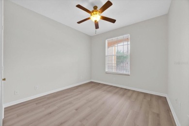 NEWLY updated(paint, flooring, dishwasher) with highly rated on Hunters Creek Golf Course in Florida - for sale on GolfHomes.com, golf home, golf lot