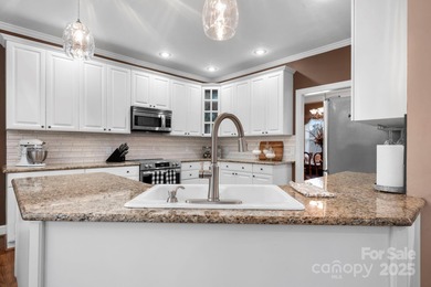 Stately and beautifully updated, this impressive 5-bedroom, 2 on Catawba Springs Golf Course At Lake Hickory  in North Carolina - for sale on GolfHomes.com, golf home, golf lot