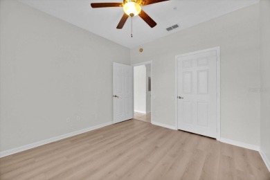 NEWLY updated(paint, flooring, dishwasher) with highly rated on Hunters Creek Golf Course in Florida - for sale on GolfHomes.com, golf home, golf lot