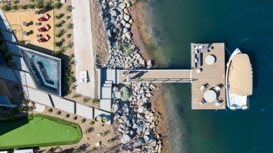 This design pays great attention to the entry procession on Reflection Bay Golf Club in Nevada - for sale on GolfHomes.com, golf home, golf lot