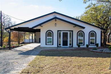 Beautifully remodeled 2 BR, 2.5 BA home on approx. 0.5 acre in on Nocona Hills Golf Course in Texas - for sale on GolfHomes.com, golf home, golf lot