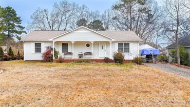 Waterfront living conveniently located near town! A home with a on Piney Point Golf Club in North Carolina - for sale on GolfHomes.com, golf home, golf lot