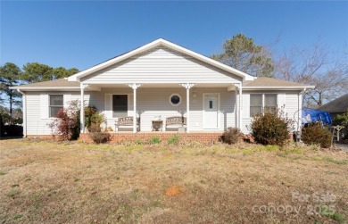 Waterfront living conveniently located near town! A home with a on Piney Point Golf Club in North Carolina - for sale on GolfHomes.com, golf home, golf lot