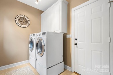 Stately and beautifully updated, this impressive 5-bedroom, 2 on Catawba Springs Golf Course At Lake Hickory  in North Carolina - for sale on GolfHomes.com, golf home, golf lot