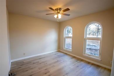 Beautifully remodeled 2 BR, 2.5 BA home on approx. 0.5 acre in on Nocona Hills Golf Course in Texas - for sale on GolfHomes.com, golf home, golf lot