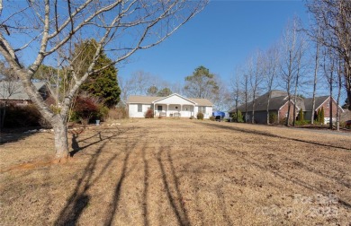 Waterfront living conveniently located near town! A home with a on Piney Point Golf Club in North Carolina - for sale on GolfHomes.com, golf home, golf lot