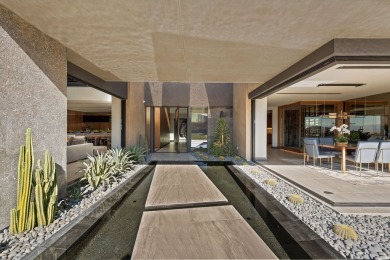 This design pays great attention to the entry procession on Reflection Bay Golf Club in Nevada - for sale on GolfHomes.com, golf home, golf lot