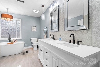 Stately and beautifully updated, this impressive 5-bedroom, 2 on Catawba Springs Golf Course At Lake Hickory  in North Carolina - for sale on GolfHomes.com, golf home, golf lot