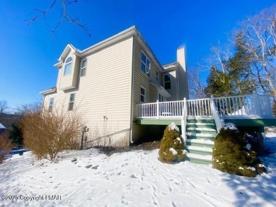 This MAJESTIC home with STUNNING views offers 5 bedrooms, 4 on Country Club of the Poconos Golf Course in Pennsylvania - for sale on GolfHomes.com, golf home, golf lot