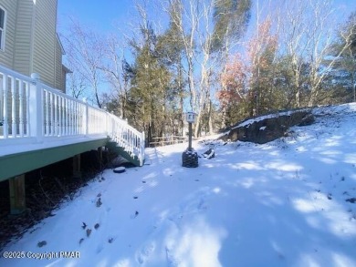 This MAJESTIC home with STUNNING views offers 5 bedrooms, 4 on Country Club of the Poconos Golf Course in Pennsylvania - for sale on GolfHomes.com, golf home, golf lot