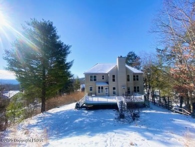 This MAJESTIC home with STUNNING views offers 5 bedrooms, 4 on Country Club of the Poconos Golf Course in Pennsylvania - for sale on GolfHomes.com, golf home, golf lot