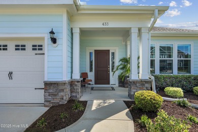 Situated on the 16th green of the Beau Rivage Golf Course, this on Beau Rivage Golf and Resort in North Carolina - for sale on GolfHomes.com, golf home, golf lot