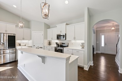 Situated on the 16th green of the Beau Rivage Golf Course, this on Beau Rivage Golf and Resort in North Carolina - for sale on GolfHomes.com, golf home, golf lot