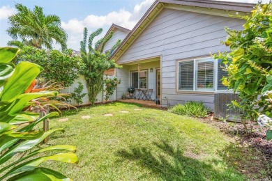 Discover comfort and convenience in this single-level end unit on Hoakalei Country Club At Ocean Pointe in Hawaii - for sale on GolfHomes.com, golf home, golf lot