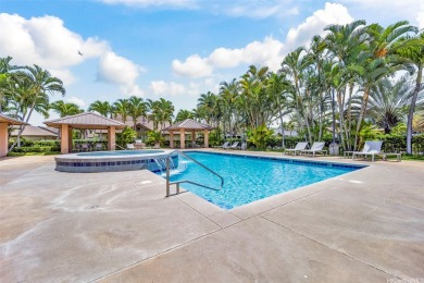 Discover comfort and convenience in this single-level end unit on Hoakalei Country Club At Ocean Pointe in Hawaii - for sale on GolfHomes.com, golf home, golf lot